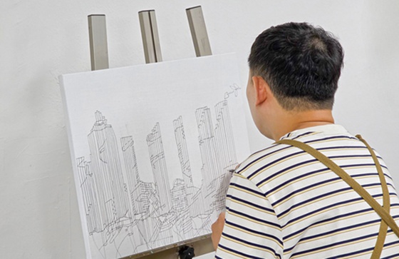 장애예술인 한화석 작가. ©기쁜우리복지관