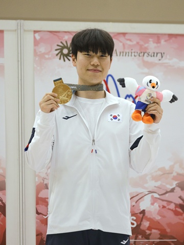 지난 25일 일본 도쿄 아지노모토 국립훈련센터 사격장에서 열린 남자 25m 속사 권총에서 금메달을 획득한 이승화 선수. ©한국농아인스포츠연맹