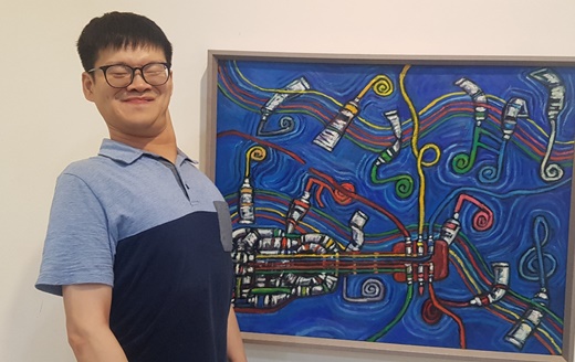 뇌병변장애인 미술작가 김재호 씨.ⓒ에이블뉴스DB
